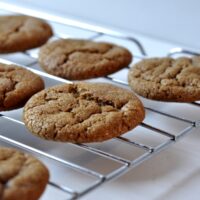 Cooling rack of Molasses Crinkles Cookies on The Creekside Cook
