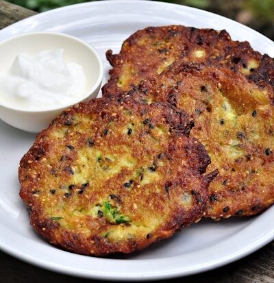 crispy zucchini fritters with sour cream for dipping