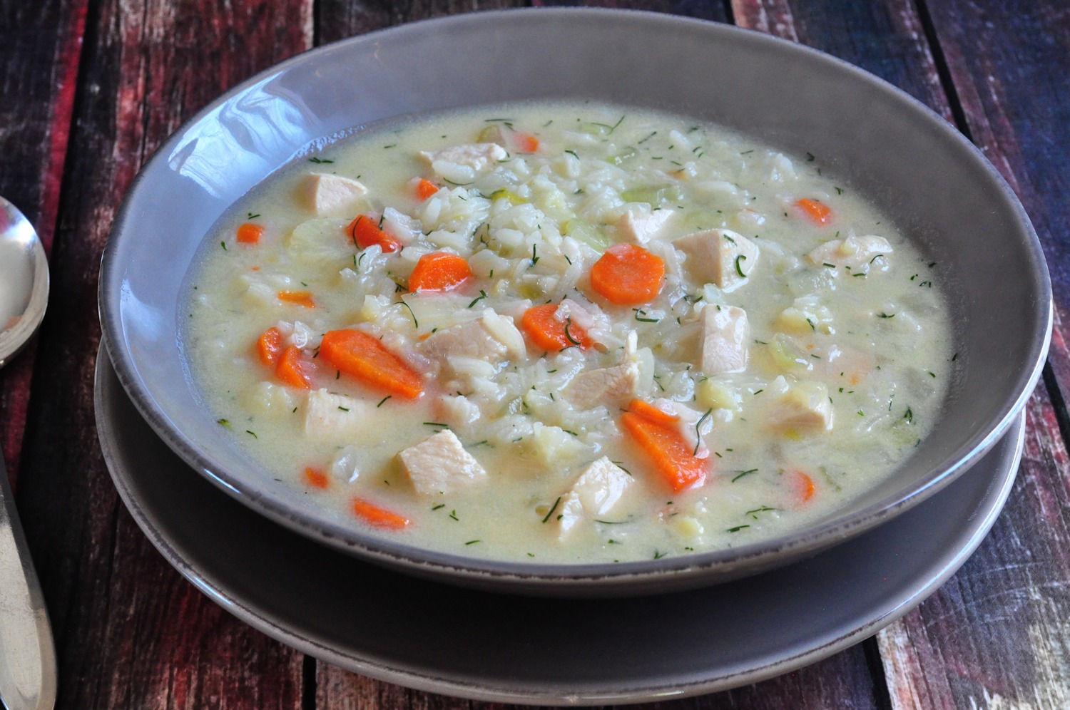 Bowl of Creamy Chicken and Rice Soup with Dill on The Creekside Cook