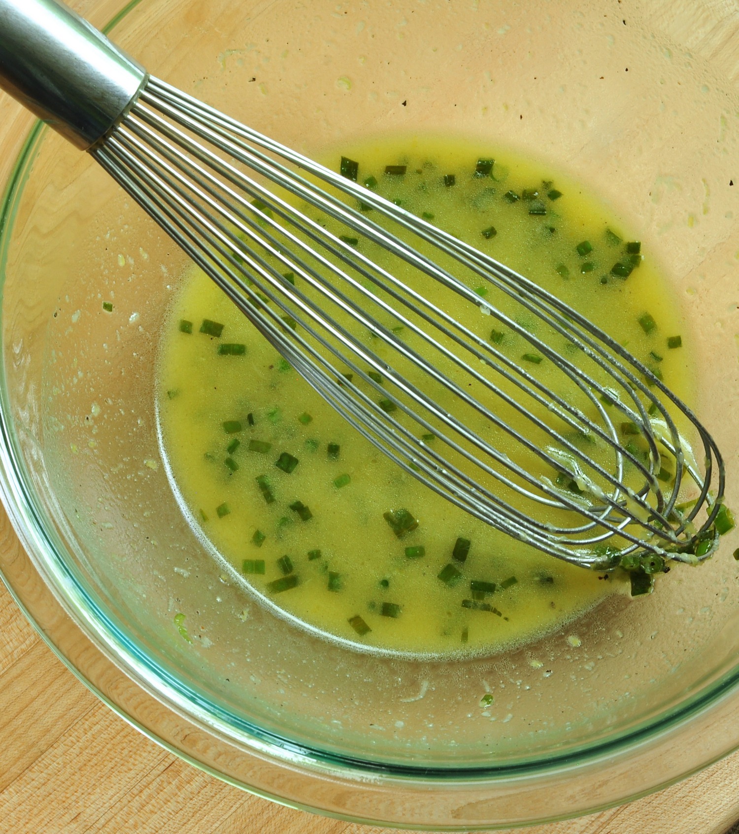 whisking the vinaigrette