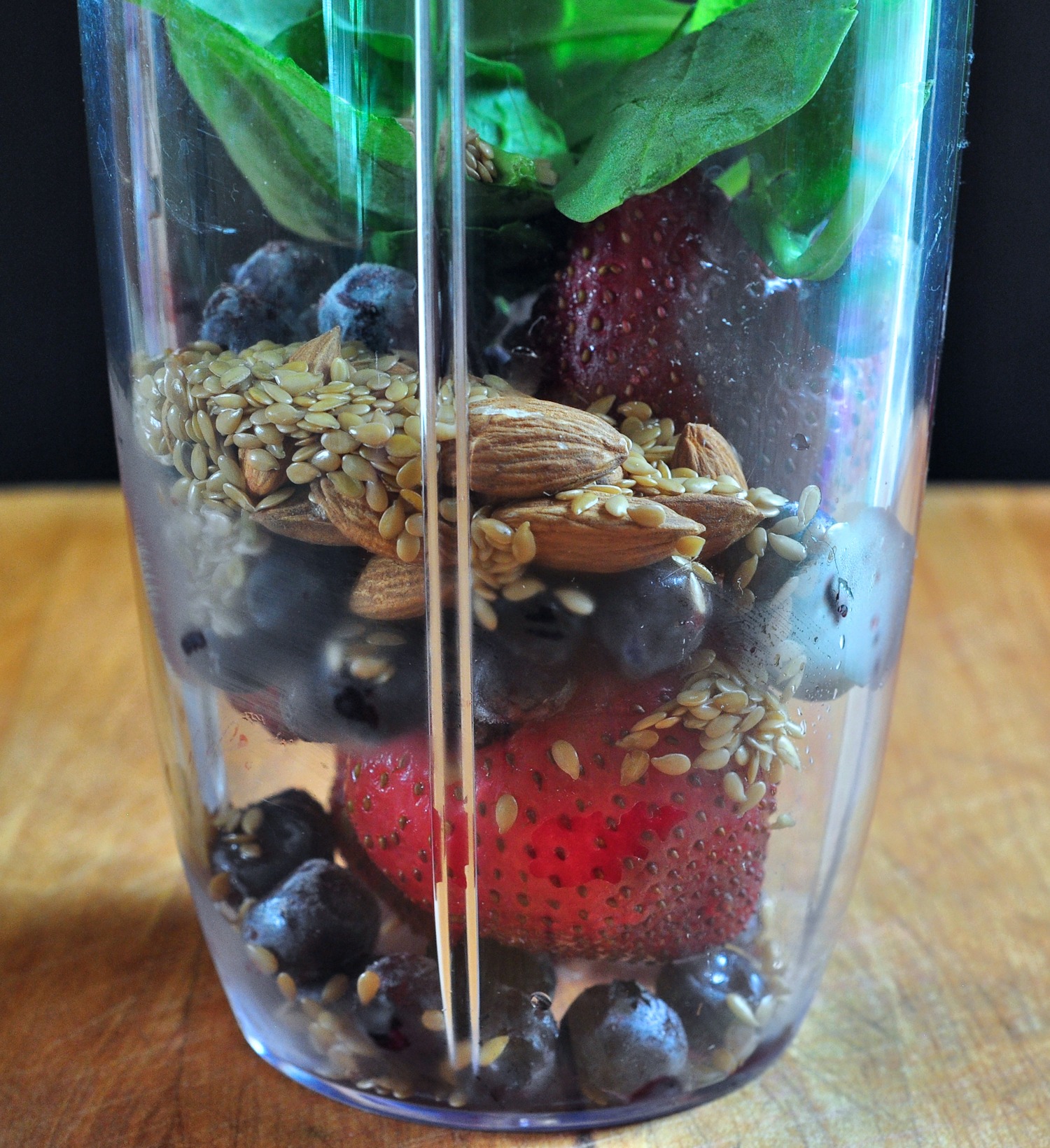 nutribullet cup with smoothie ingredients