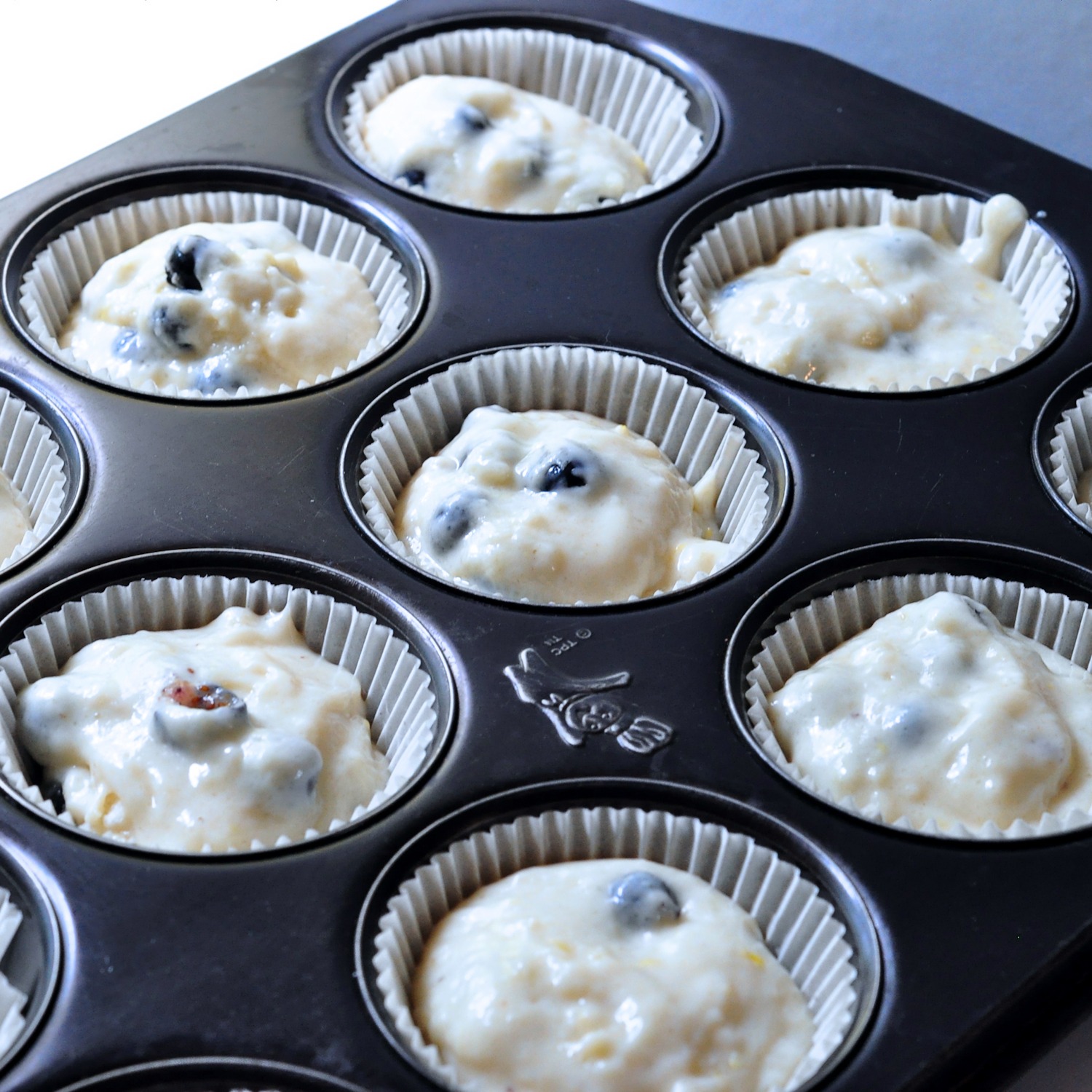 muffins going in the oven
