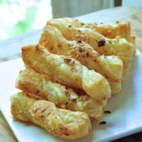 recipe card for Puff Pastry Rosemary Garlic Twists on The Creekside Cook