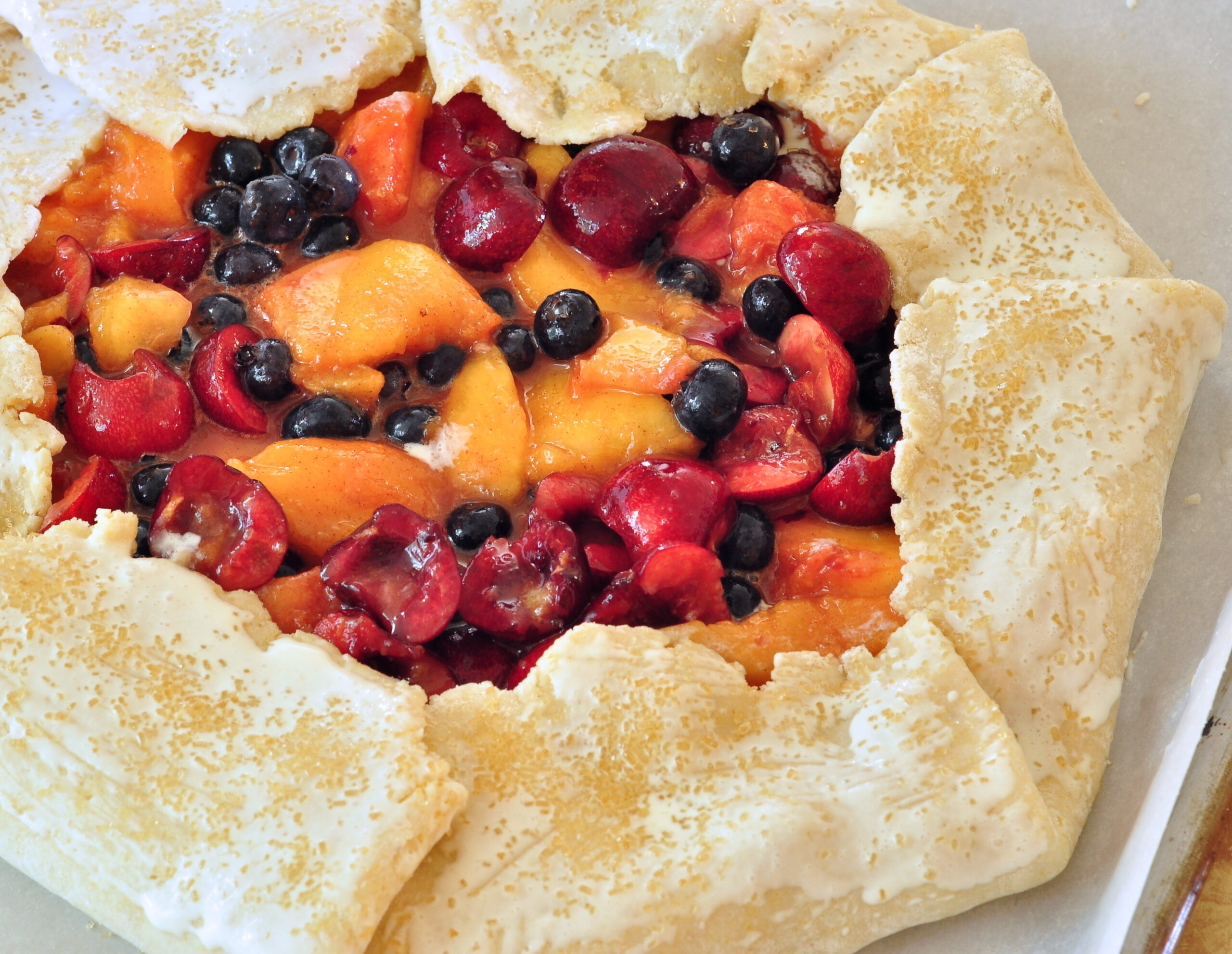 brush the crust with milk and sprinkle with sugar