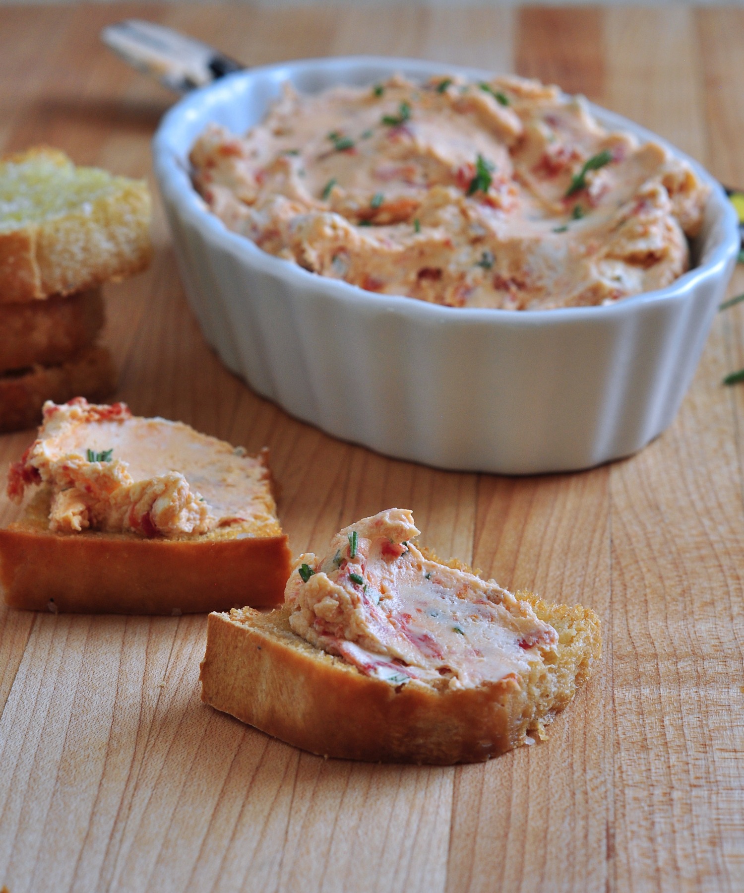 serving Goat Cheese Spread with Roasted Tomatoes and Garlic