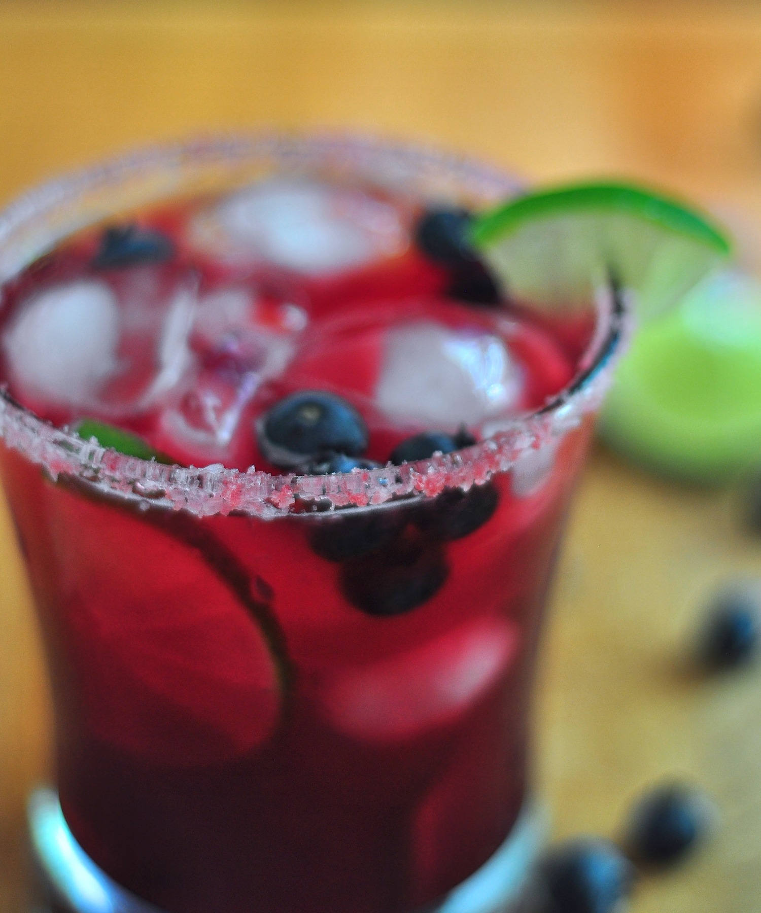 rim of a blueberry margarita