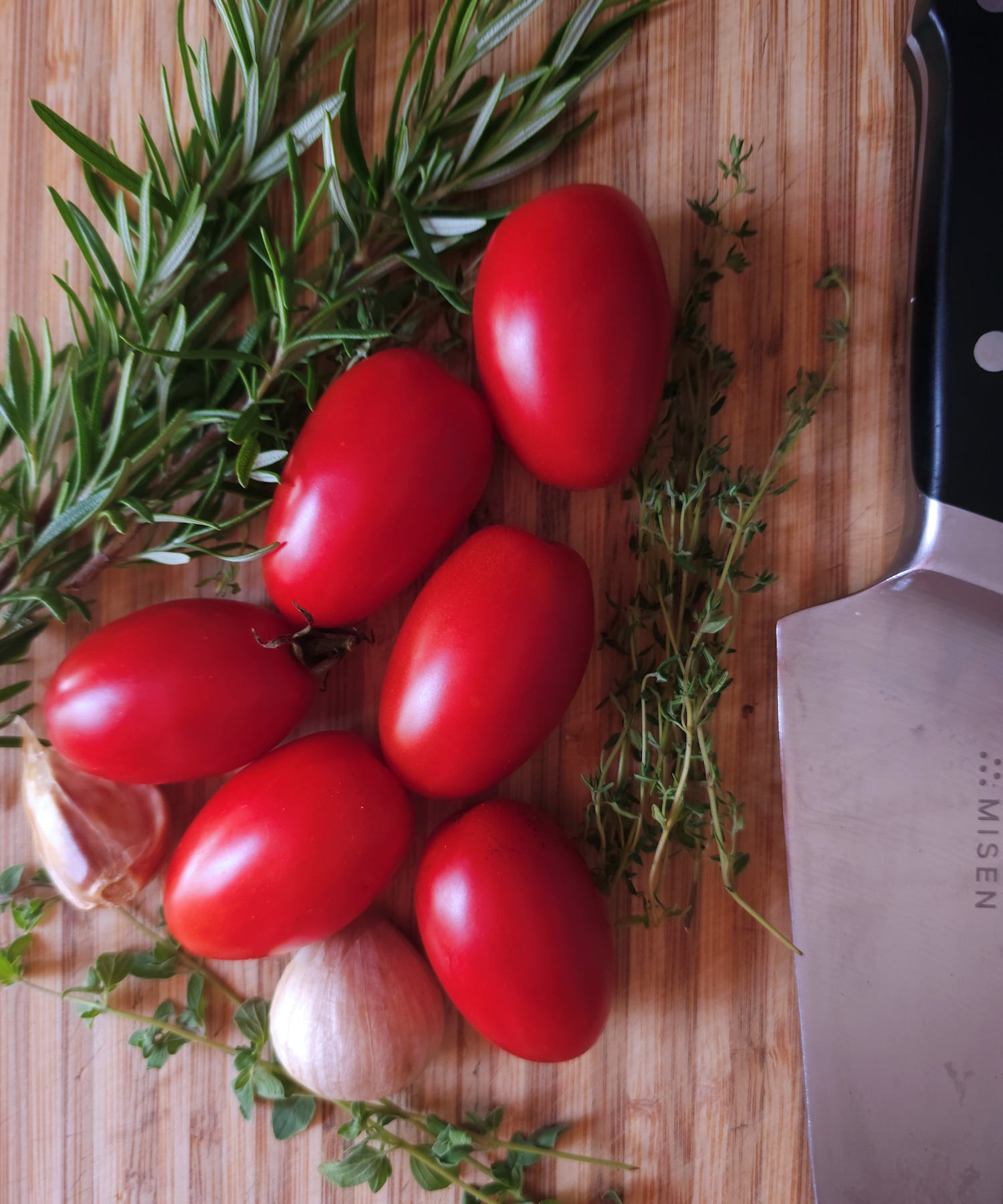 raw tomatoes and herbs