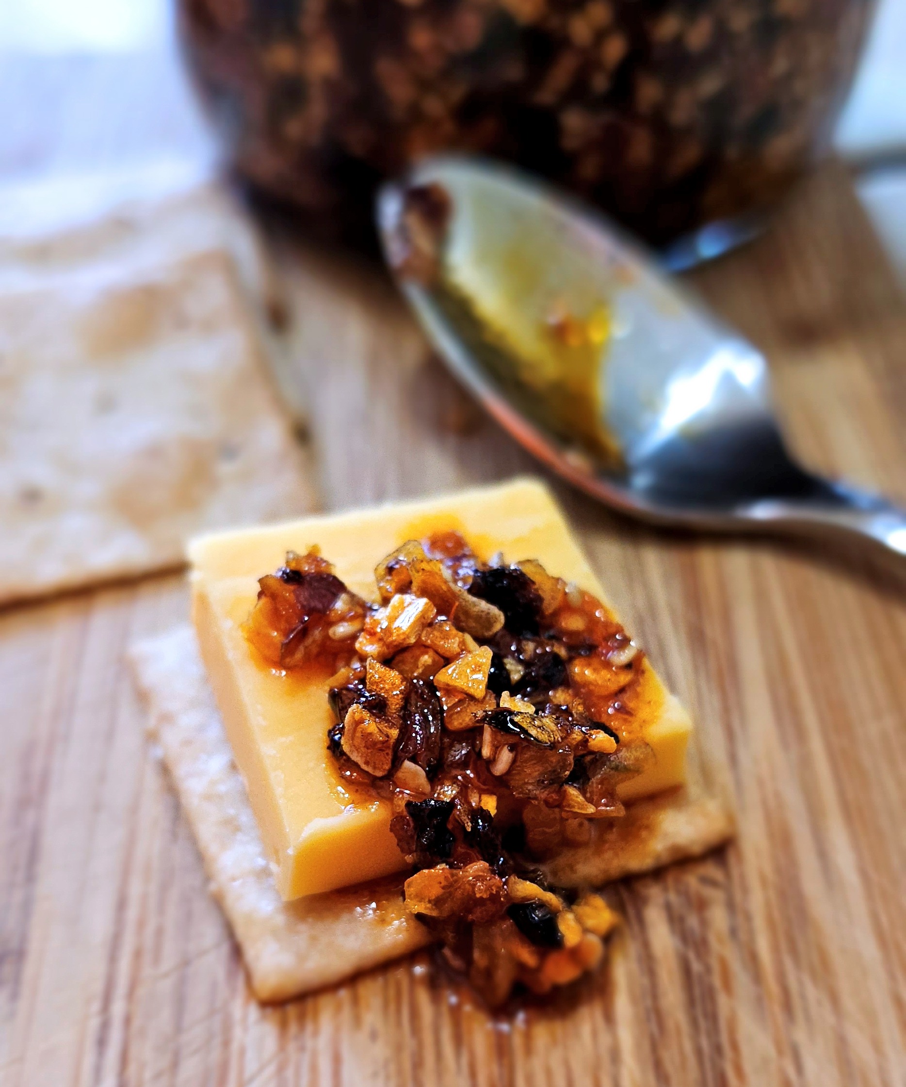 chili crisp oil on cheese and crackers